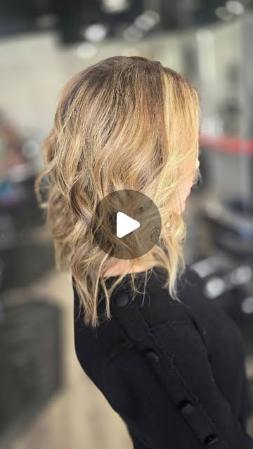 Highlights refreshed and added through a blonde lob haircut