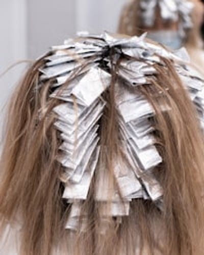 Foiled highlights woven close to the scalp